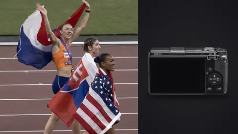 Ricoh GR IIIx product photo beside athletes celebrating with national flags raised after a race