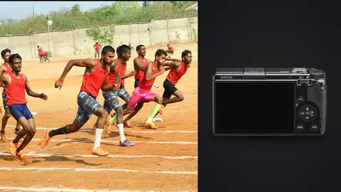 Ricoh GR IIIx product photo beside relay runners sprinting together on a dirt track carrying batons