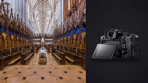 Sony Alpha 1 product photo beside dark wood cathedral choir stalls with blue and gold canopies