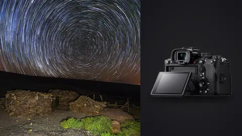 Sony Alpha 1 product photo beside circular star trails over ancient stone ruins