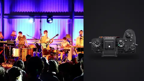 Sony Alpha 1 product photo beside band performing on stage with crowd