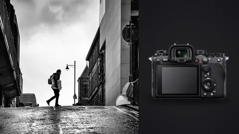 Sony Alpha 1 product photo beside silhouetted figure walking up a sloped city street