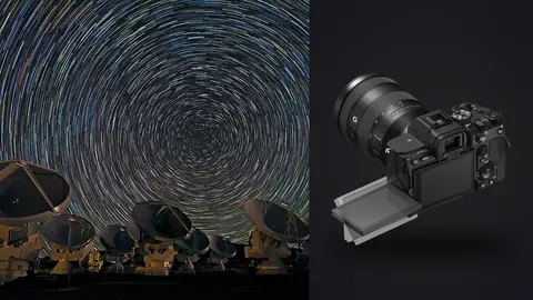 Sony a7 IV product photo beside whirling southern star trails over an array of radio telescopes