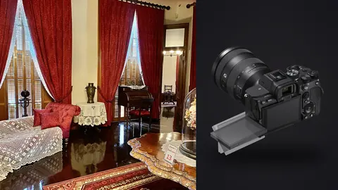 Sony a7 IV product photo beside vintage sitting nook with a chaise lounge and floral curtains