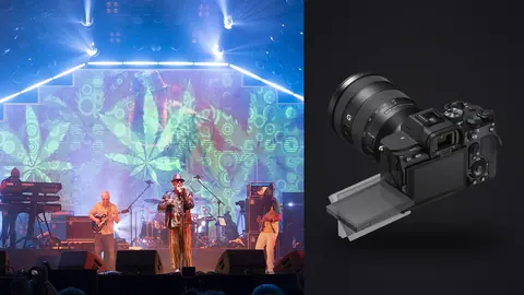 Sony a7 IV product photo beside band performing on stage with colorful backdrop