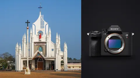 Sony a7R V product photo beside white gothic-style church facade against blue sky