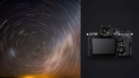 Sony a7R V product photo beside warm-toned star trails above a mountain observatory dome