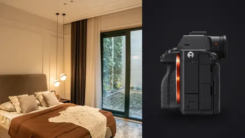 Sony a7R V product photo beside cozy bedroom with garden view through glass doors