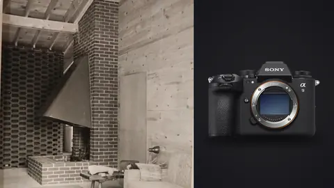Sony a9 III product photo beside industrial style room with exposed concrete and brick fireplace