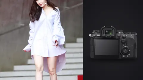 Sony a9 III product photo beside model in an oversized white shirt posing on white steps