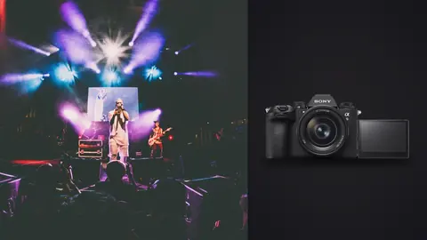 Sony a9 III product photo beside singer performing on stage with colorful light beams