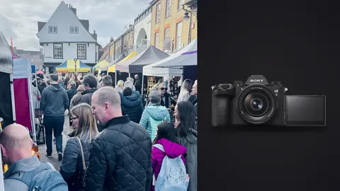 Sony a9 III product photo beside crowd browsing colorful market stalls on a high street